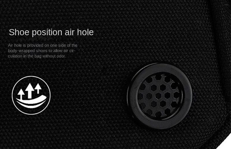 Close-up of sports bag shoe compartment air hole for ventilation, highlighting the odor-preventing design feature.