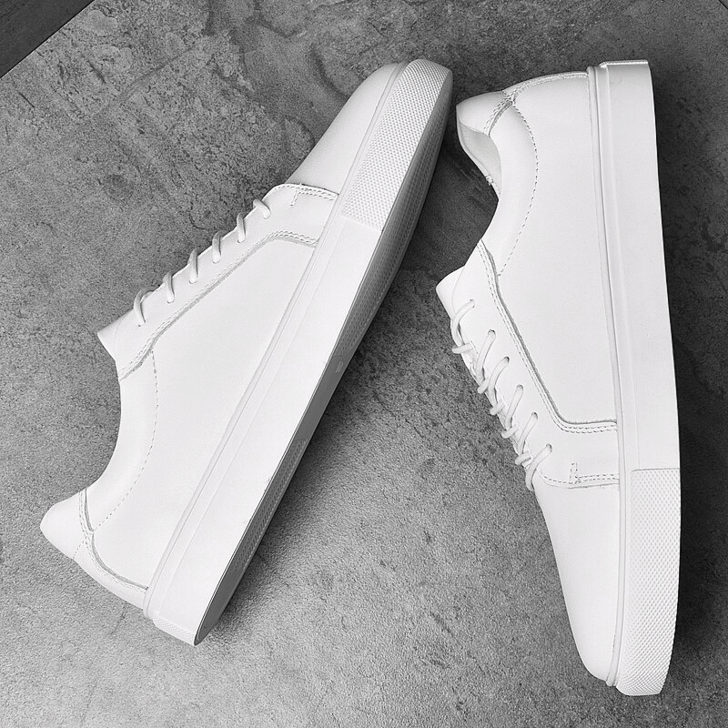 Men's sports flexible flat-sole leather sneakers SF1177, featuring a breathable design and massage insole on a textured surface.