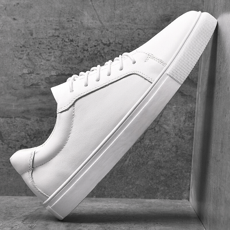 Men's white leather sneakers with flexible flat sole, lace-up closure, and modern design, perfect for sports and casual wear - SF1177