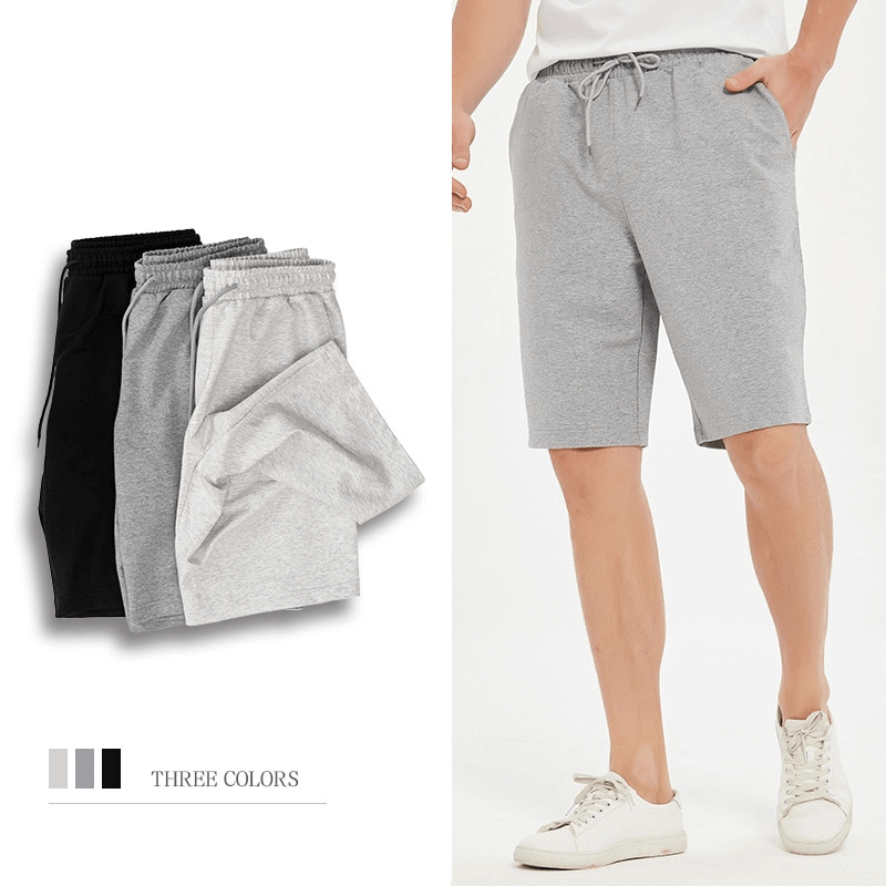 Men's sports loose cotton shorts, running breeches in black, grey, and light grey. Comfortable and durable for all workouts.