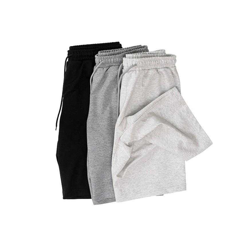 Three pairs of men's sports loose cotton shorts in black, grey, and light grey, perfect for running, offering comfort and mobility - SF1088