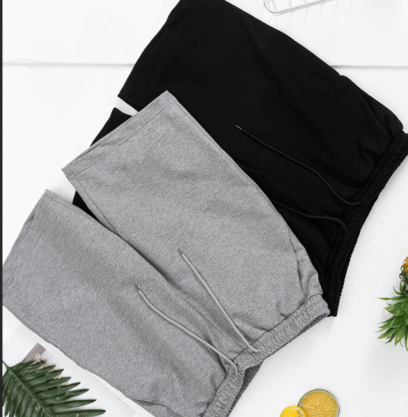 Black and gray men's sports loose cotton shorts, perfect for running, featuring a breathable design and comfortable fit for active males.