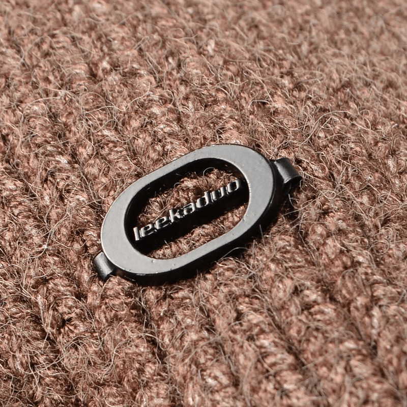 Close-up of Men's Sports Warm Running Knitted Hat in camel color with brand logo, showcasing textured knit detail.