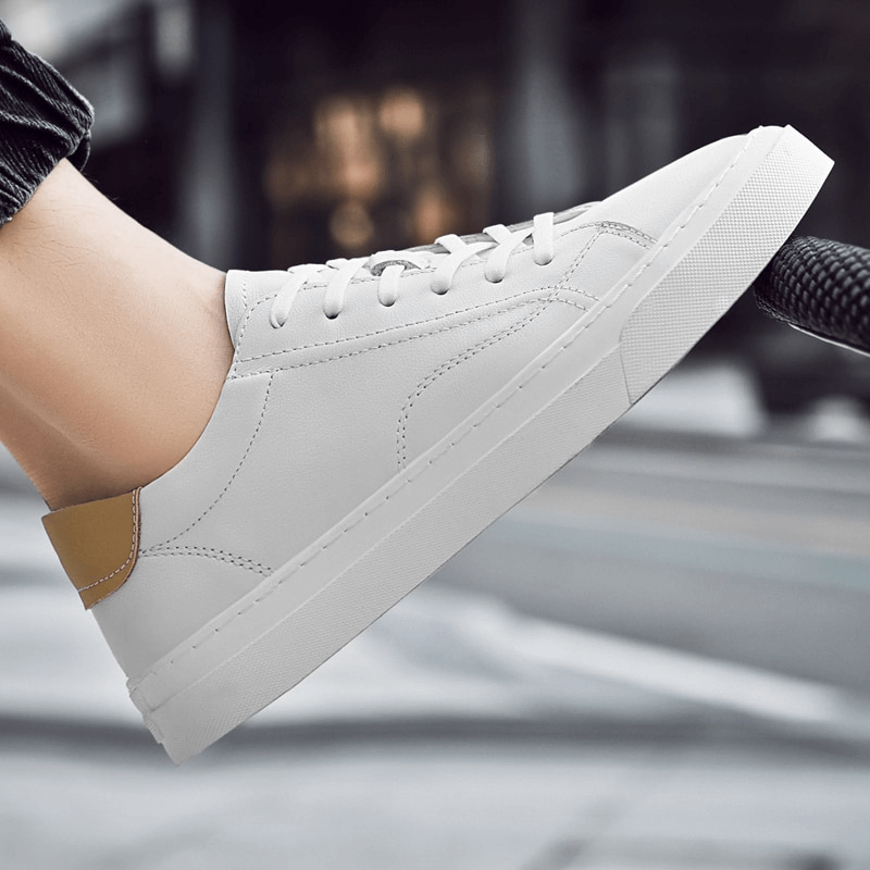 Men's sporty flexible flat sole sneakers in white, genuine leather upper and full-grain leather insole, perfect for casual wear.