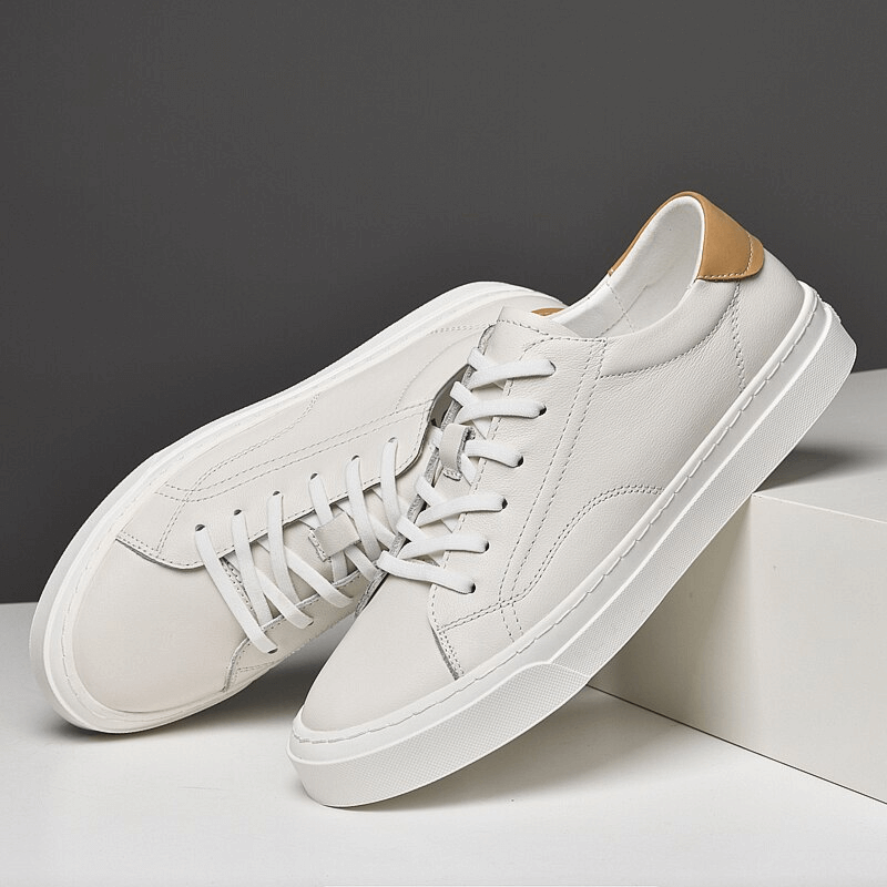 Men's sporty flat sole sneakers SF1172 with genuine leather uppers, full-grain insoles, and lace-up design, in white color.