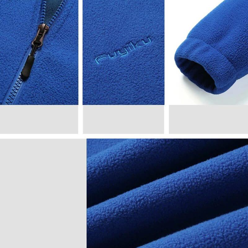 Close-up of blue fleece jacket fabric, zipper detail and cuff, showcasing the soft polyester texture and durable design.