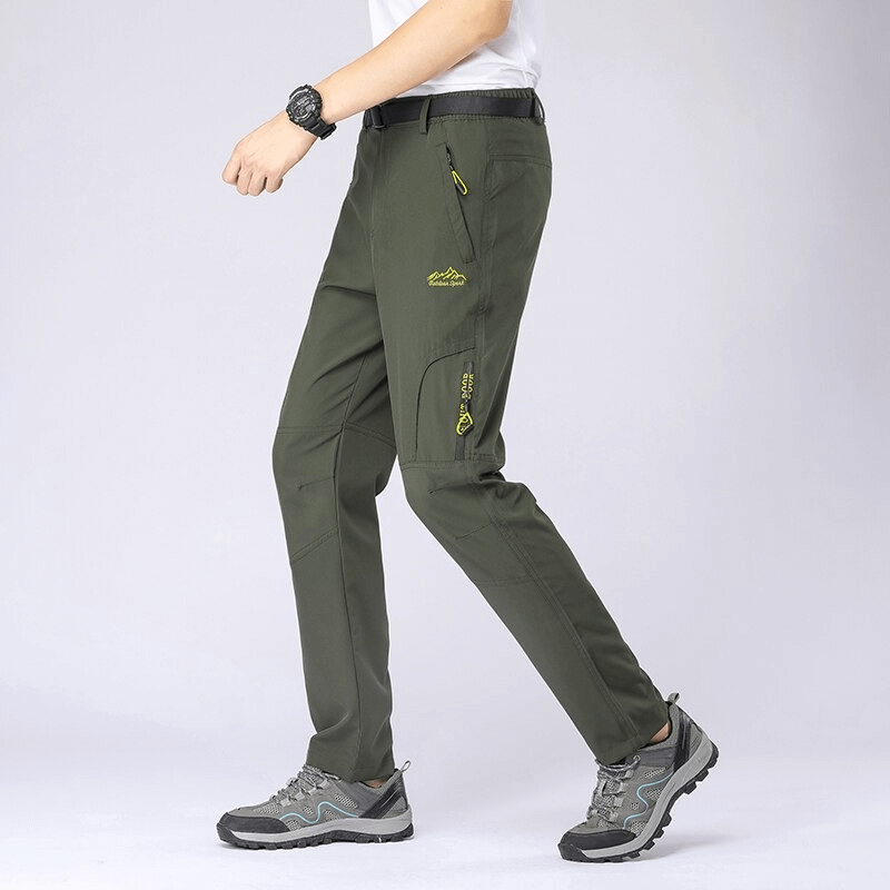 Men's Stretch Waterproof Tactical Trousers SF0457 in green, featuring multi-pockets, ideal for outdoor sports like hiking and camping.