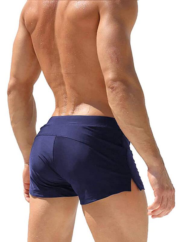 Back view of men's navy swim trunks with zipper pocket, lightweight polyester, designed for comfort and durability in swimming.