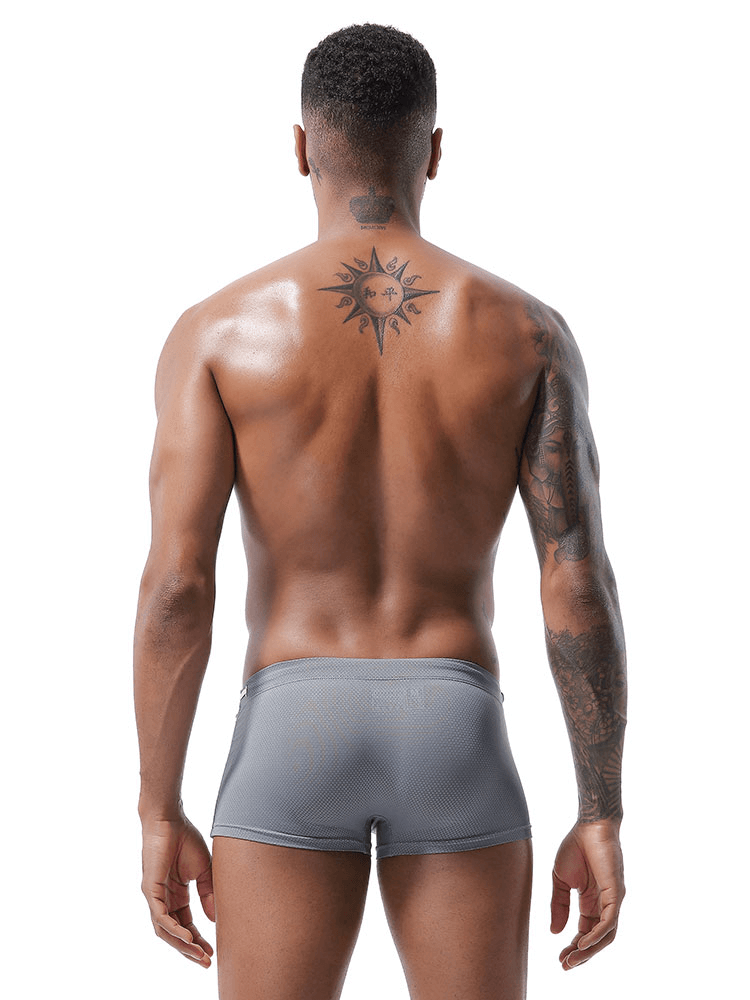 Back view of men's swim boxers with drawstring, showcasing sleek, low waist fit in solid gray color, ideal for beach or pool.
