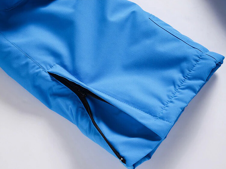 Blue men's warm ski pants with zip pocket, windproof and waterproof, perfect for skiing and snowboarding. Anti-pilling polyester fabric.