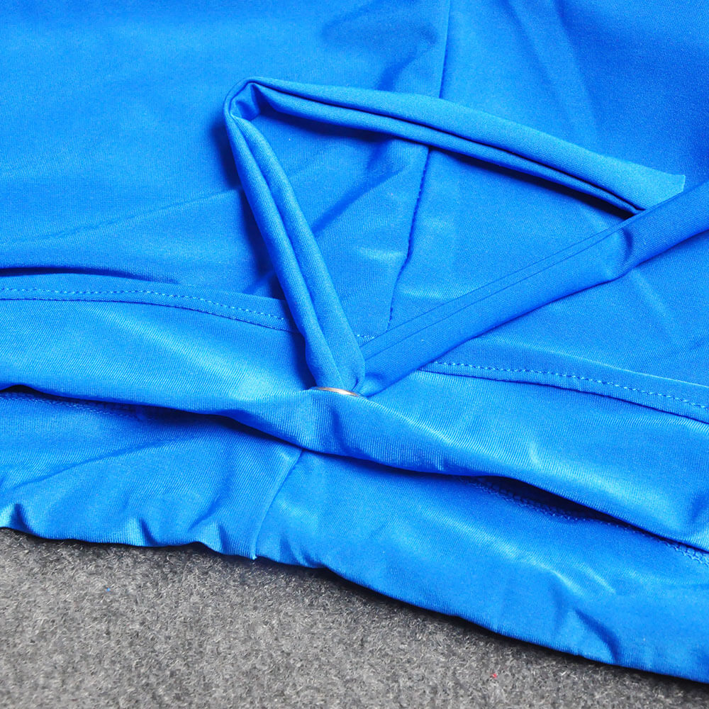 Close-up of blue men's yoga pants fabric texture, showcasing durable polyester and spandex blend designed for flexible movement.