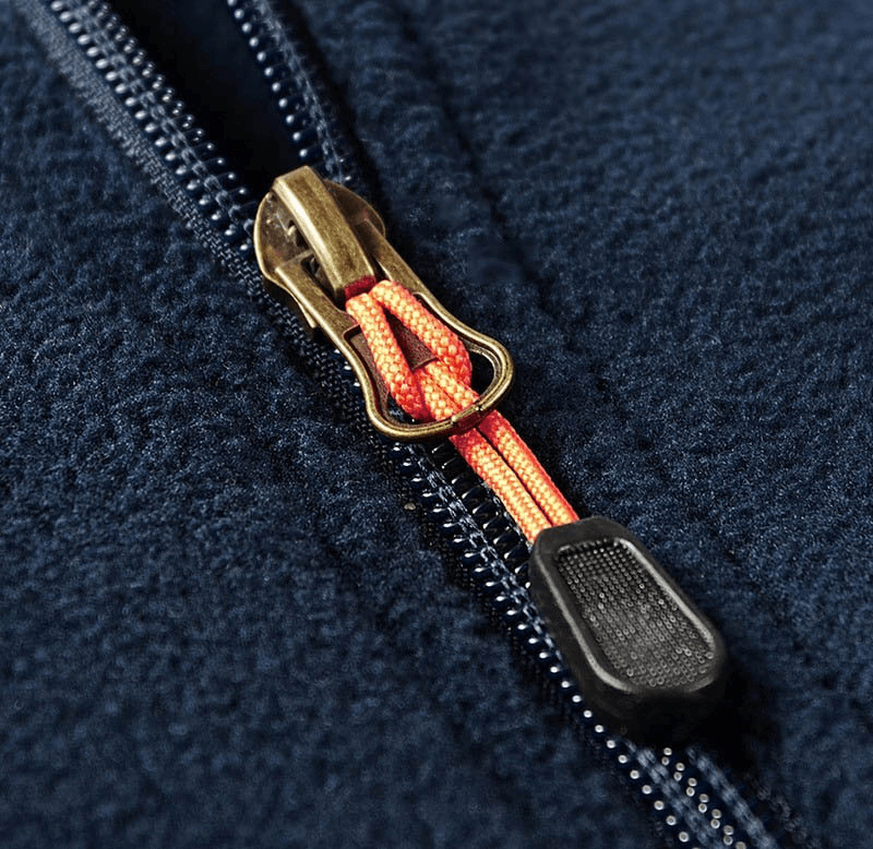 Close-up of the zipper detail on men's fleece hiking jacket, showcasing durable craftsmanship and outdoor-ready design.
