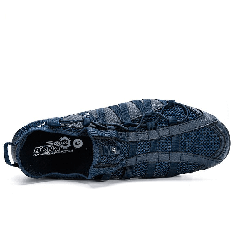 Mesh breathable lightweight men's sneakers with flexible rubber soles, showcasing air mesh upper and EVA insoles for comfort.