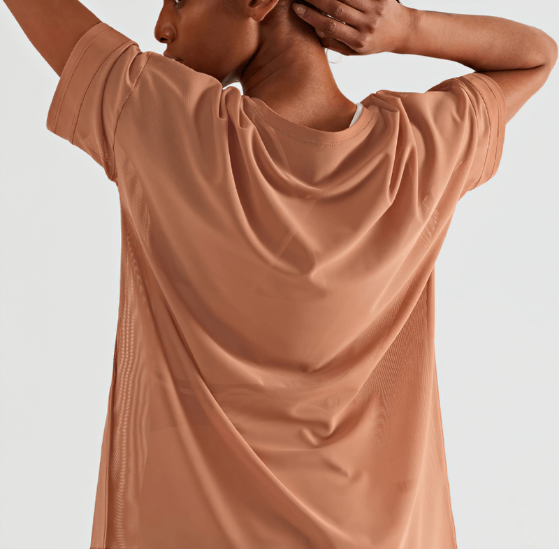 Back view of woman wearing a mesh casual quick-drying fitness T-shirt in brown, perfect for workouts and yoga.