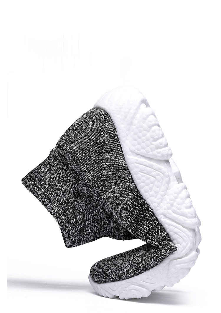 Mesh Elastic Breathable Unisex Sneakers SF1215 in black, showcasing flexible slip-on design and cushioned sole.