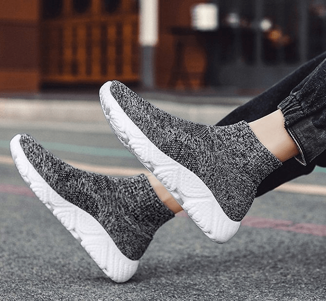 Mesh Elastic Breathable Unisex Sneakers with air mesh and EVA cushioning, slip-on comfort, and massage insole, ideal for everyday wear.