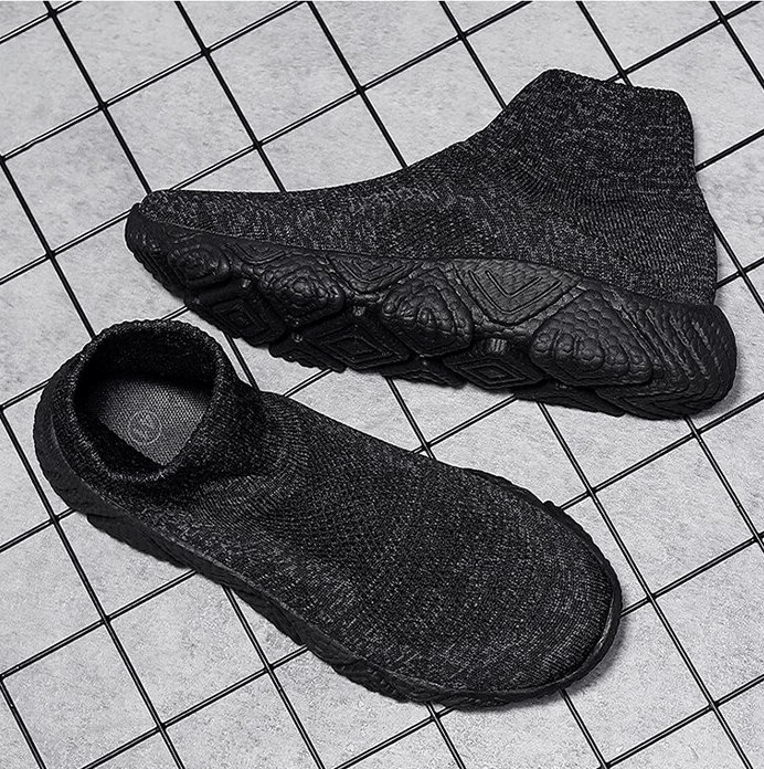 Mesh elastic breathable unisex sneakers SF1215 in black color with slip-on design and air mesh construction, perfect for everyday wear.