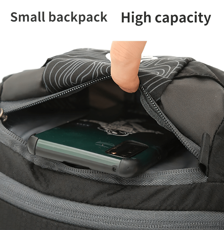 Close-up of a black sports waist bag's storage with phone, small backpack, high capacity, perfect for outdoor activities.