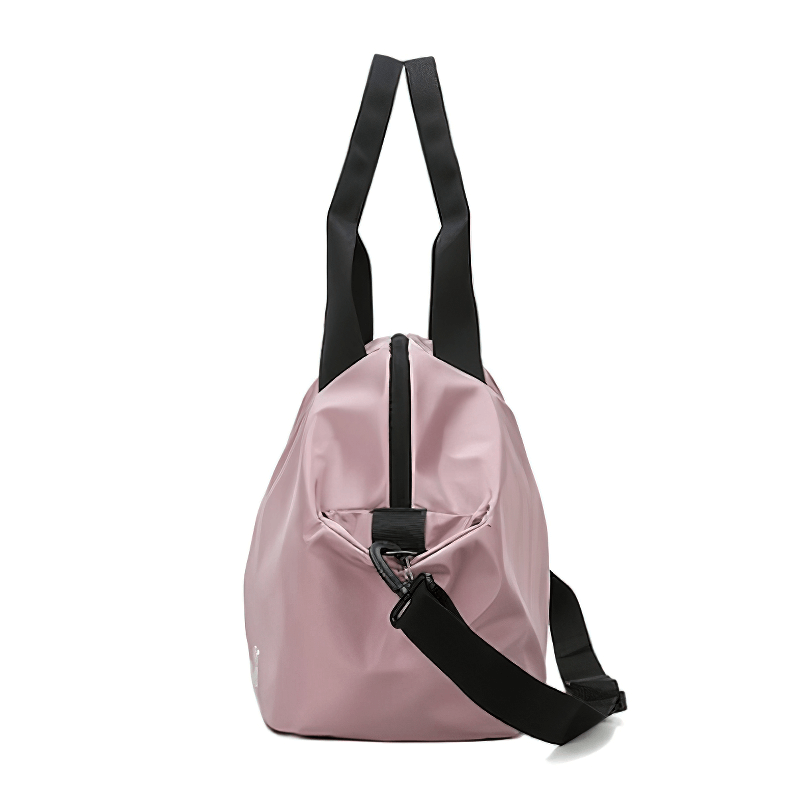 Side view of pink multifunction waterproof women's large capacity gym bag with black straps and durable design, ideal for travel and fitness.