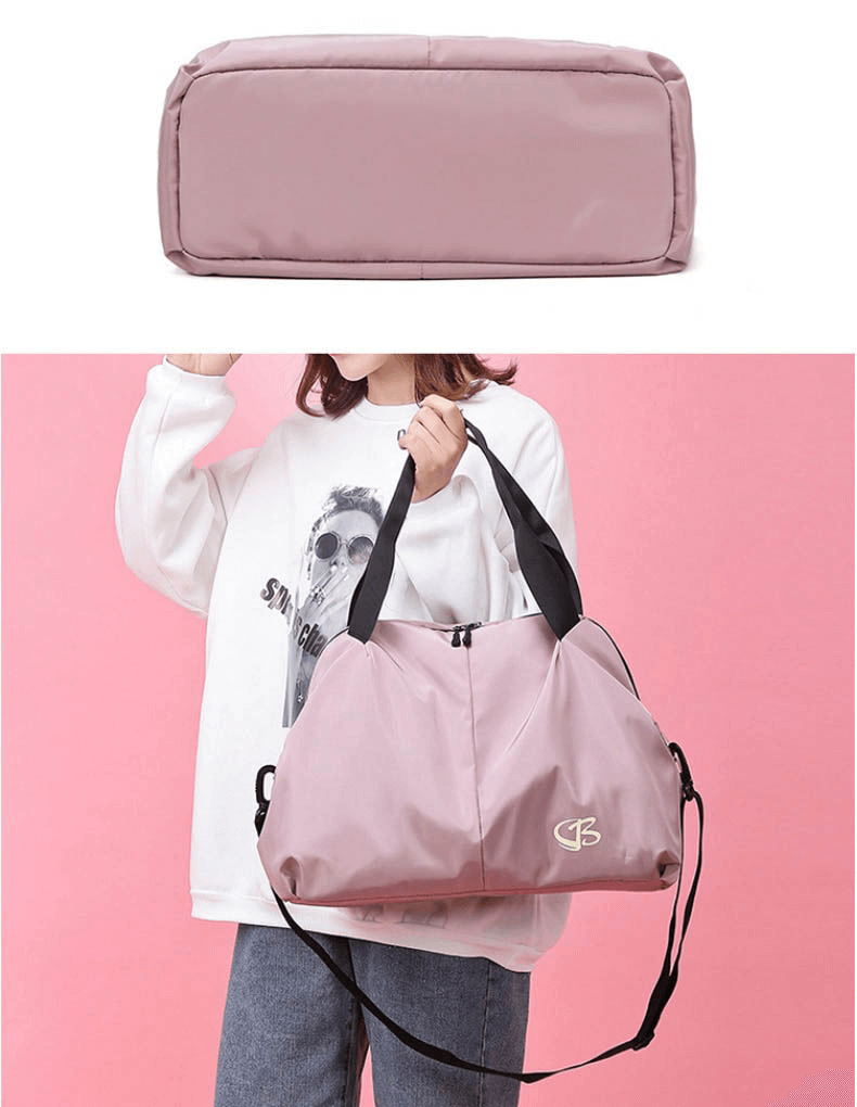 Woman holding pink Multifunction Waterproof Women's Large Capacity Gym Bag (SF0904) made of durable nylon and oxford cloth.