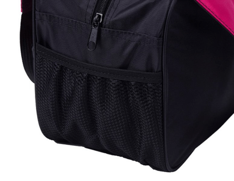 Close-up of a black and pink multifunctional waterproof sport women's bag with mesh side pocket and durable zipper.