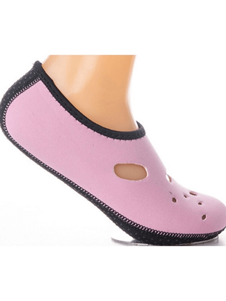 Pink non-slip beach water shoes with rubber soles, perfect for diving and swimming, shown in a side profile view.