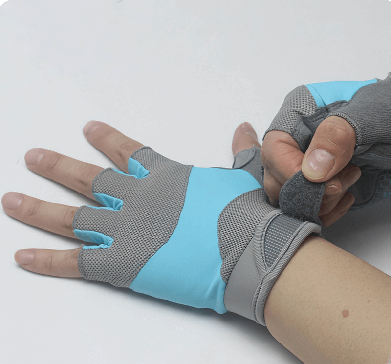 Putting on non-slip breathable half-finger gloves in blue and gray for weightlifting, yoga, and cycling. Unisex and durable.