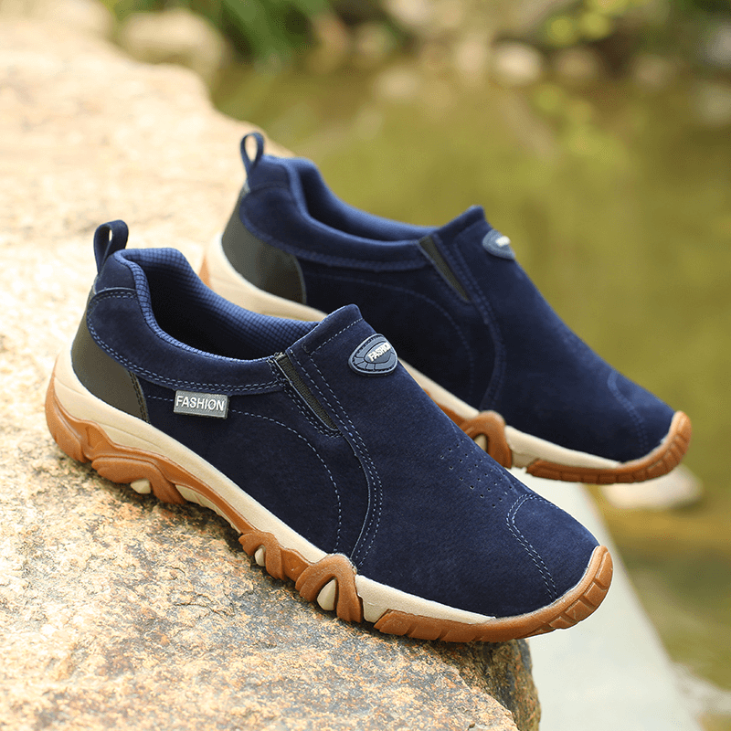 Non-slip outdoor hiking shoes for men in navy blue, featuring stretch fabric upper and rubber outsole for ultimate grip and comfort.