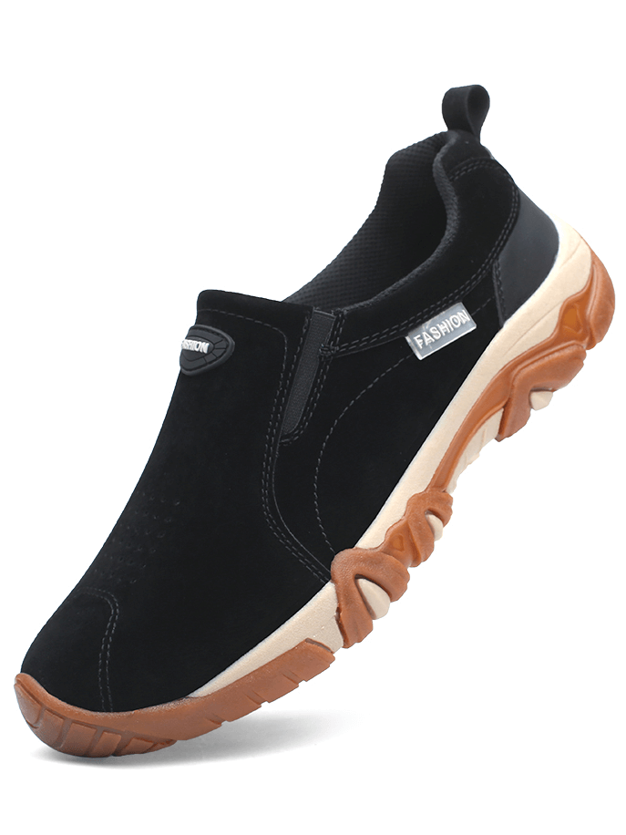 Black non-slip hiking shoe for men, featuring a rubber outsole and breathable stretch fabric for outdoor adventures.
