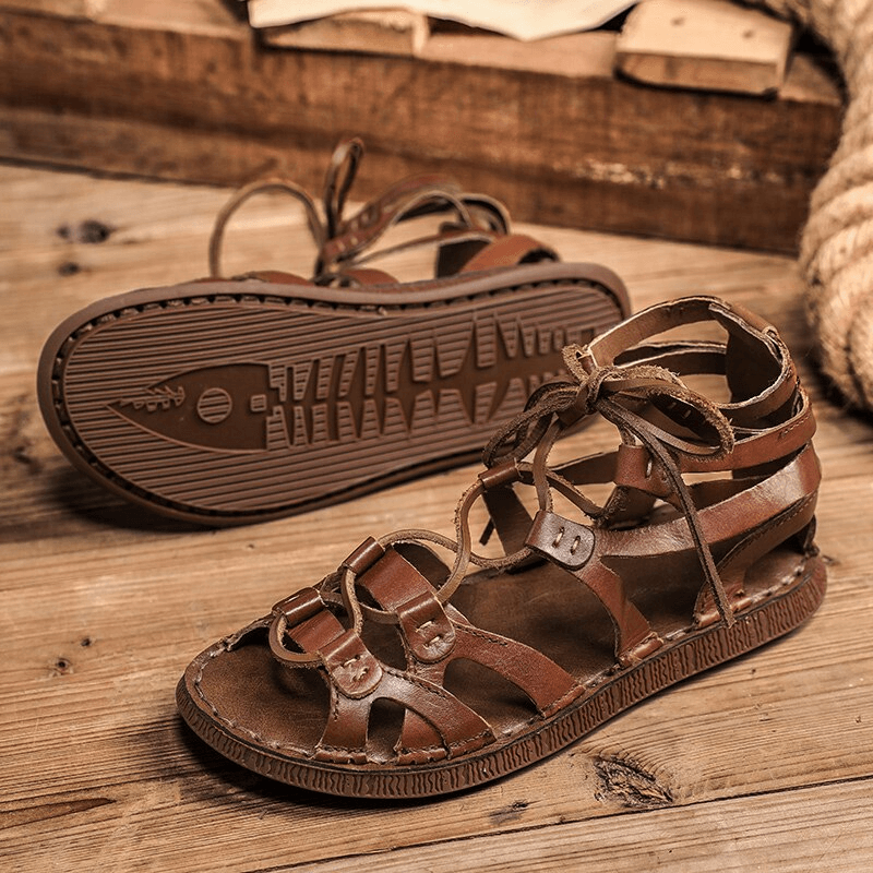 Men's non-slip lightweight leather trekking sandals on wooden floor