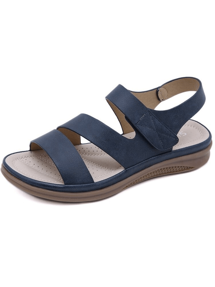 Stylish navy blue wedge sandals with PU upper, microfiber insole, and adjustable strap for women. Ideal for effortless comfort and fashion.