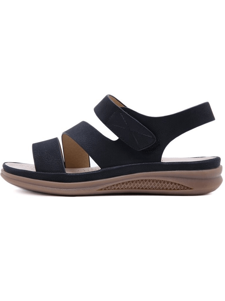 Open Light Flexible Wedge Sandals in black featuring a PU upper, microfiber insole, cross-strap design, and comfortable low heel.
