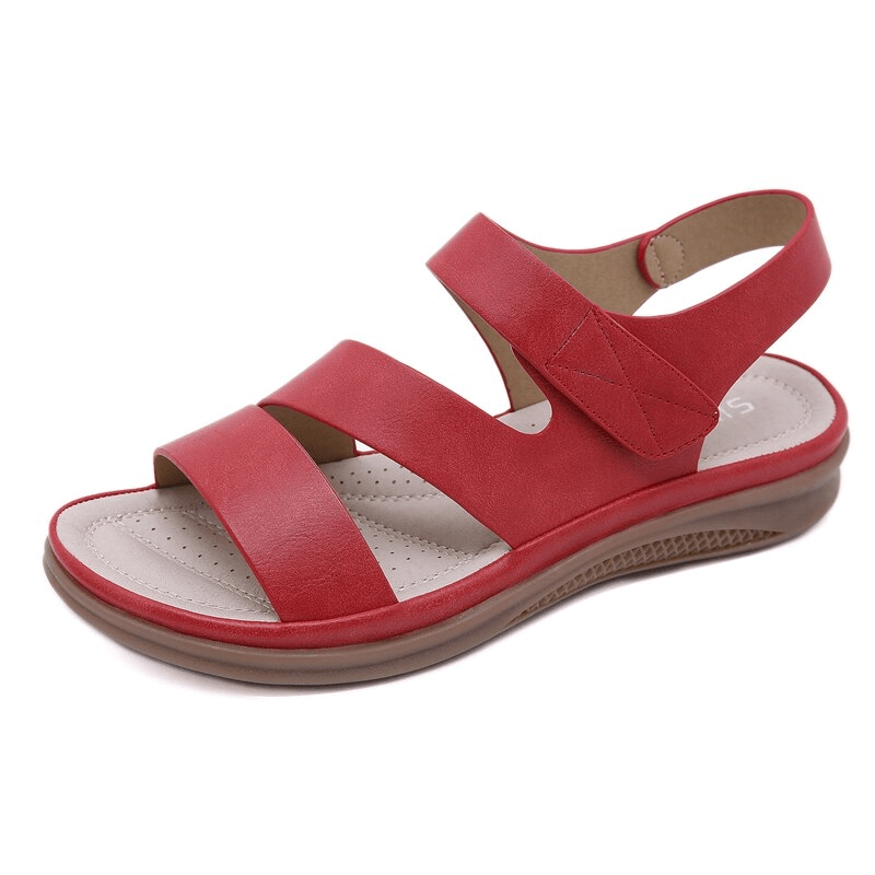 Red flexible wedge sandals for women with cross-strap design, featuring PU upper and microfiber insole. Low heel, cross-tied, perfect for summer.