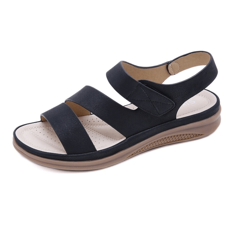 Women's open light flexible wedge sandals with PU upper, microfiber insole, black cross-strap design, low heel, and back strap closure.