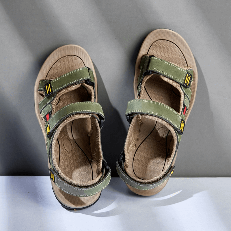 Green open toe tactical leather men's sandals with adjustable Velcro straps, featuring latex insoles and flat heel.