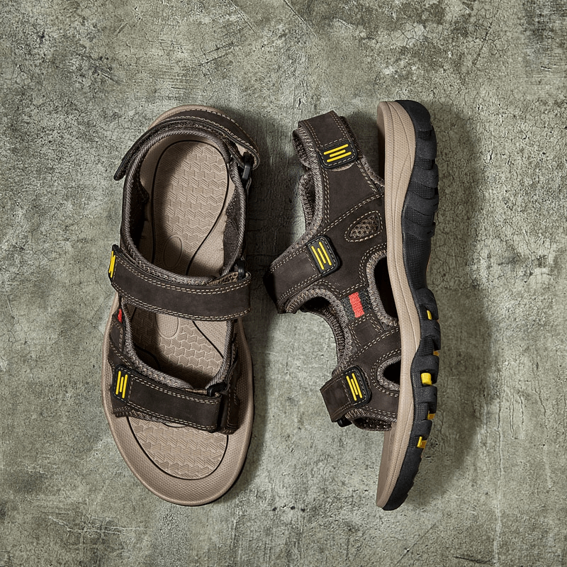 Men's tactical leather sandals with adjustable Velcro straps, flat heel, insole of latex, open toe style for comfort and style.