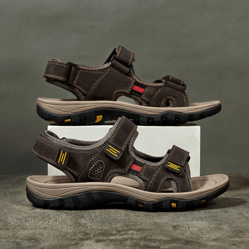 Open Toe Tactical Leather Men's Sandals with Adjustable Velcro and flat heel showcasing durability and style for casual wear.