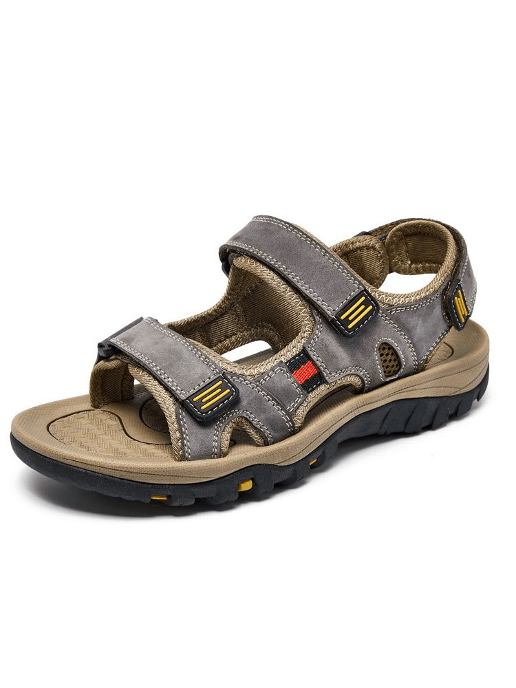 Open toe tactical leather men's sandals with adjustable velcro, featuring latex insole and flat heel for leisure style. Model SF1101.