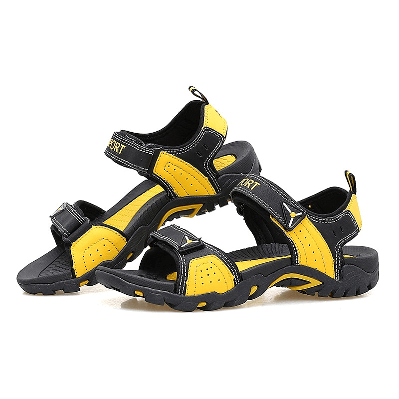 Yellow and black outdoor fashion flexible non-slip men's sandals with soft bottoms, ideal for style and comfort.
