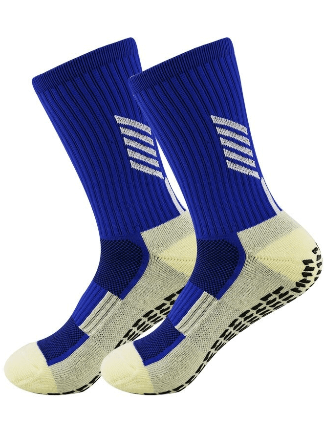 Blue outdoor football socks with silicone non-slip sole, knee-high length, designed for balance and comfort in sports.