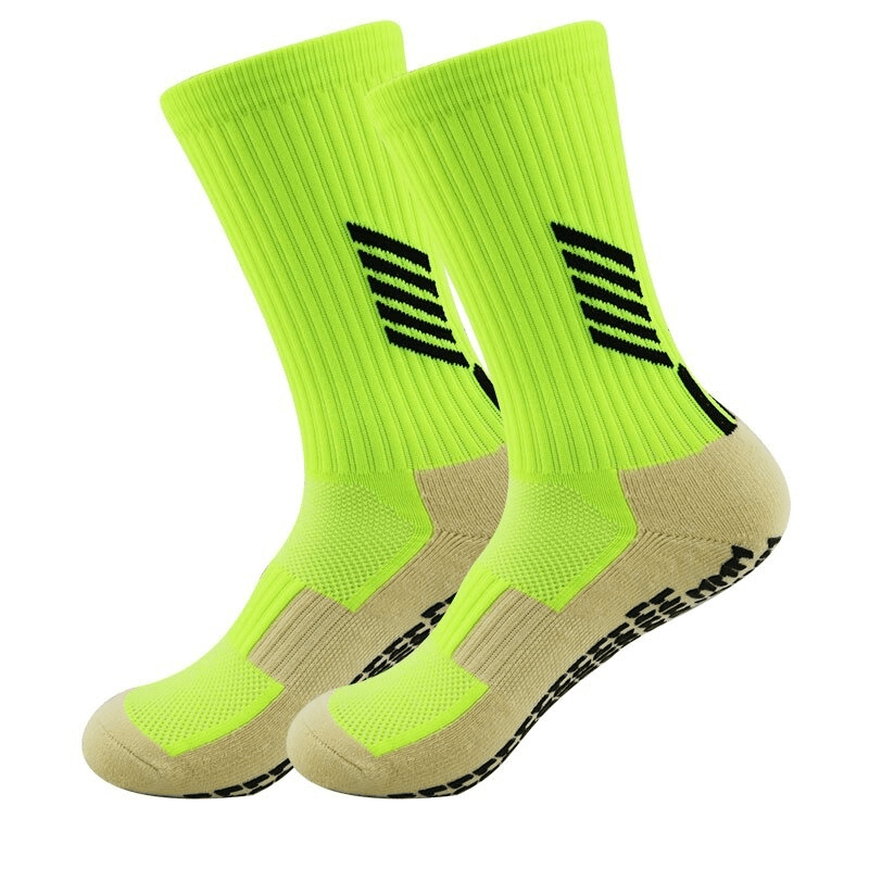 Neon green outdoor football socks with silicone non-slip sole, knee-high length for unisex use, model SF0570.
