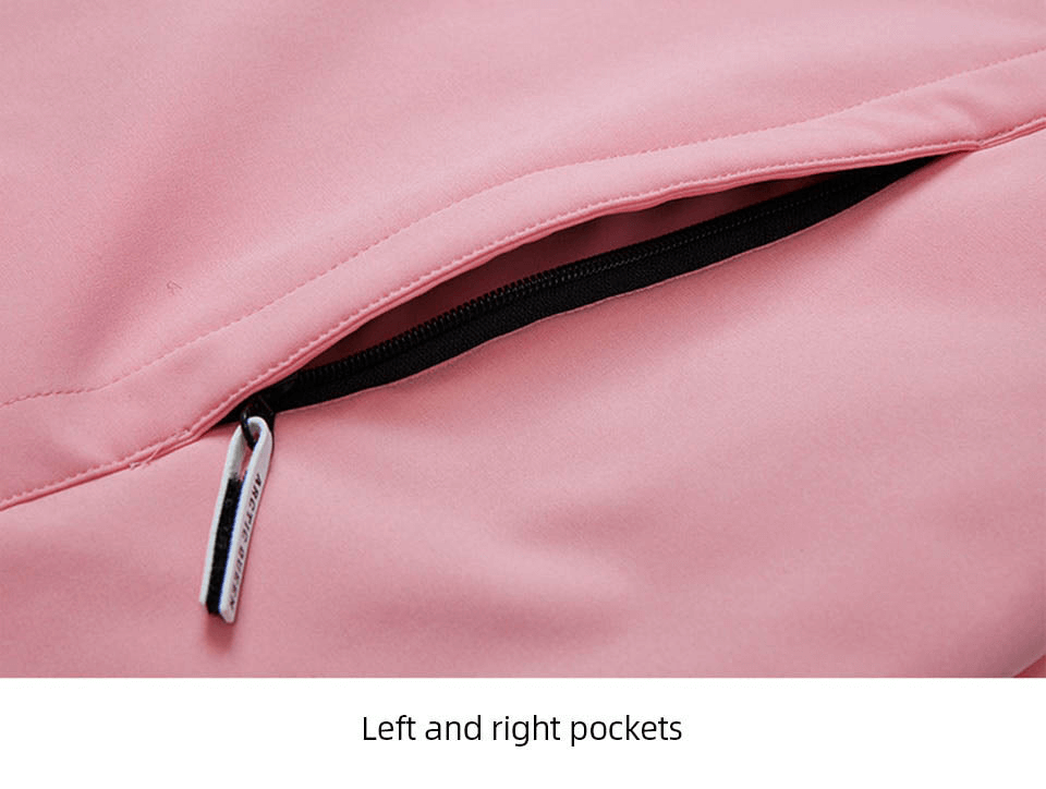 Close-up of pink snowboarding jacket waterproof pocket with zipper, highlighting left and right pockets for secure storage.
