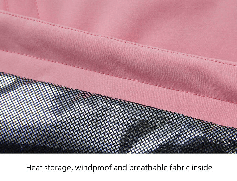 Close-up of pink outdoor jacket's heat-storing, windproof, and breathable fabric lining.