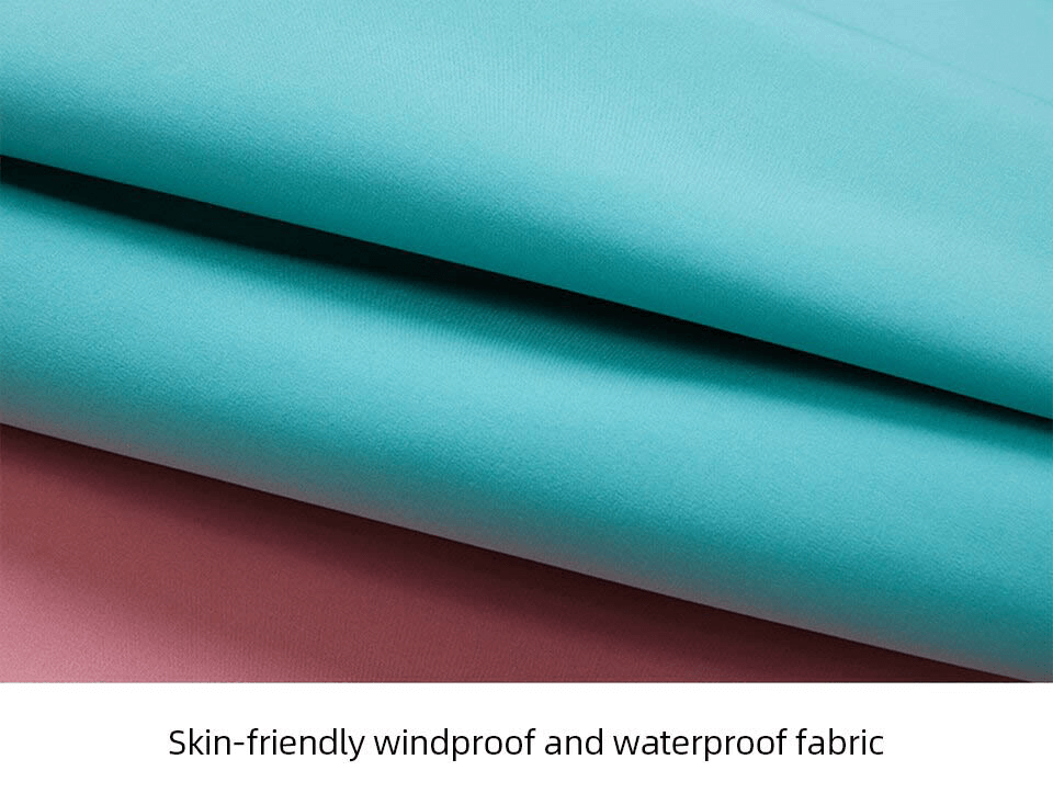 Close-up of turquoise and pink skin-friendly windproof and waterproof fabric, perfect for sporty outerwear.