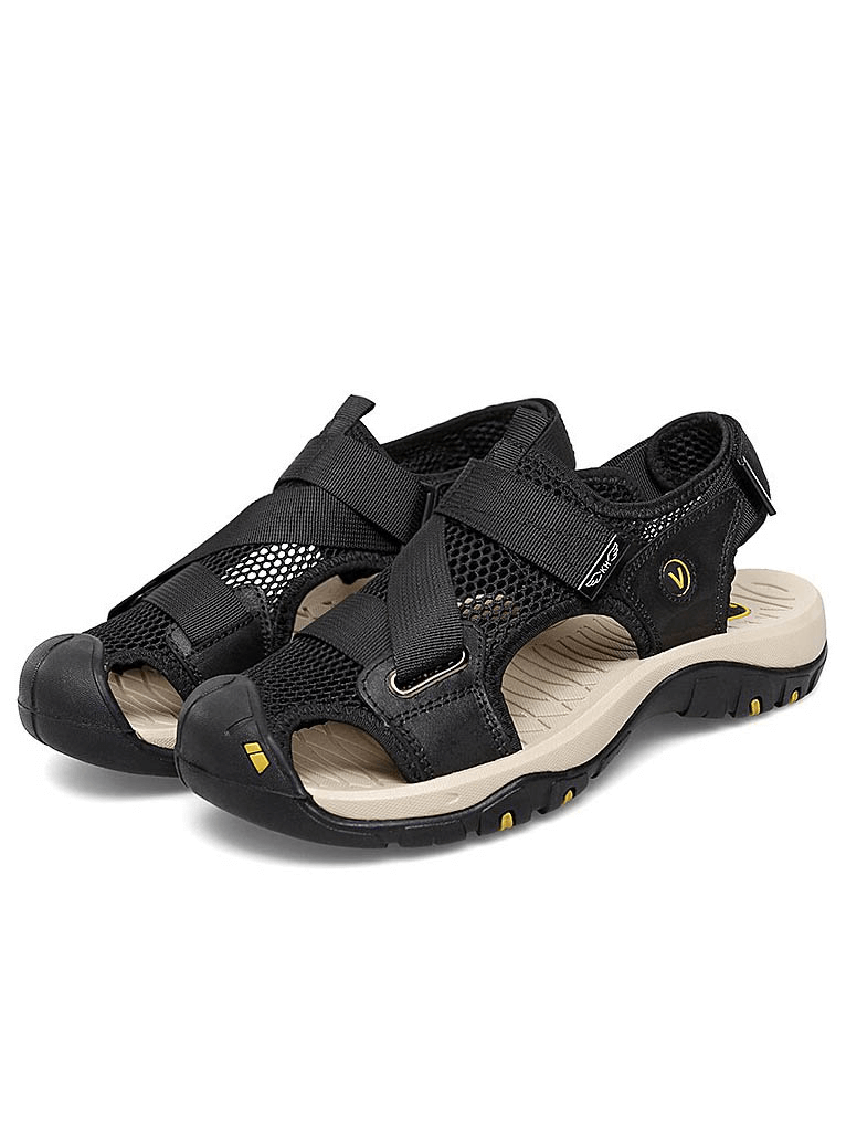 Black outdoor mesh breathable sandals with Velcro closure, solid pattern upper, rubber outsole, and PU leather insole.