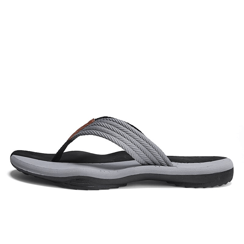 Men's outdoor non-slip beach flip flops with thick rubber sole, gray polyester upper, and EVA insole for comfort - Model SF0990.