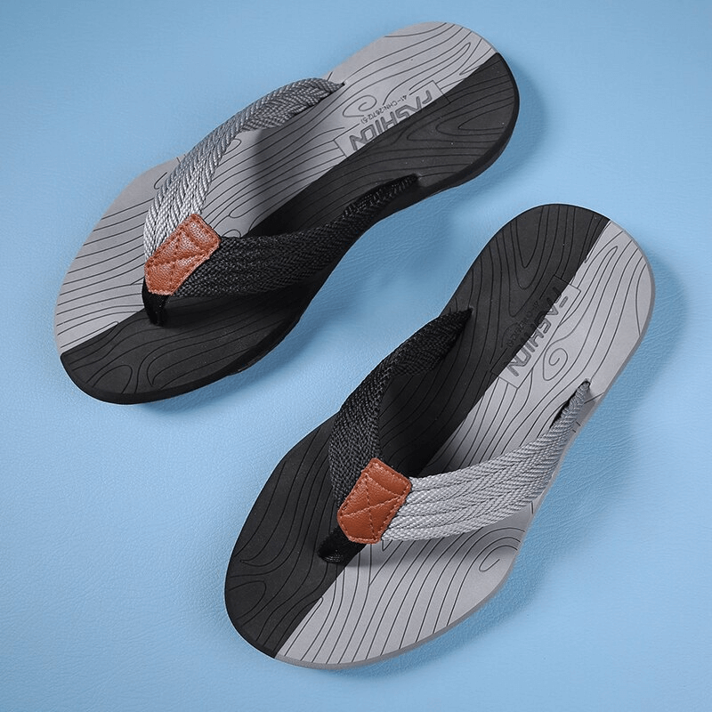 Men's outdoor non-slip slide beach flip flops with thick soles, grey and black design, ideal for stability and comfort on any terrain.