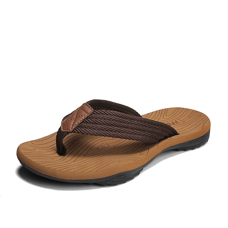 Stylish brown outdoor non-slip men's flip flops with thick rubber outsole and breathable upper. Perfect for beach adventures.