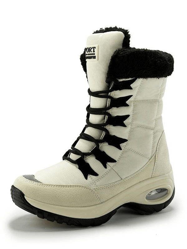 Women's waterproof snow boot SF0288, featuring leather uppers, cotton lining, and rubber outsole for icy terrain trekking.