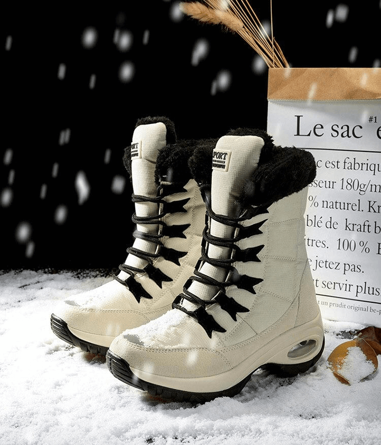 Stylish white outdoor snow boots for women with waterproof design, perfect for winter trekking and snowy adventures.